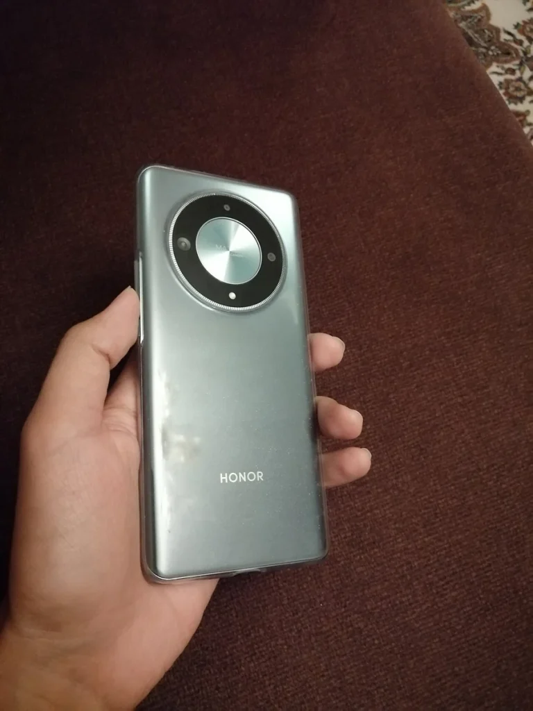 Reference photograph: Honor X9b (with phone case).jpg. Not verification of the exact planned product.