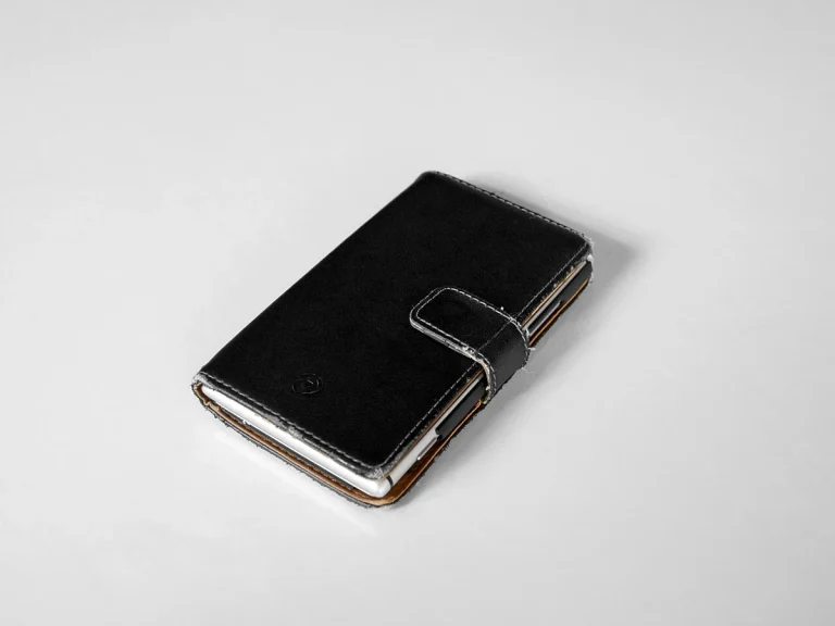 Reference photograph: Smartphone case cover black.jpg. Not verification of the exact planned product.