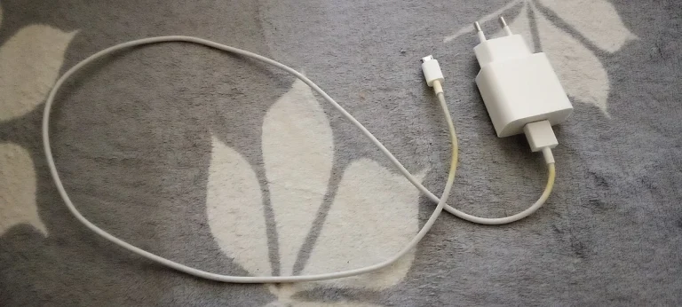 Reference photograph: Phone charger 2026.jpg. Not verification of the exact planned product.